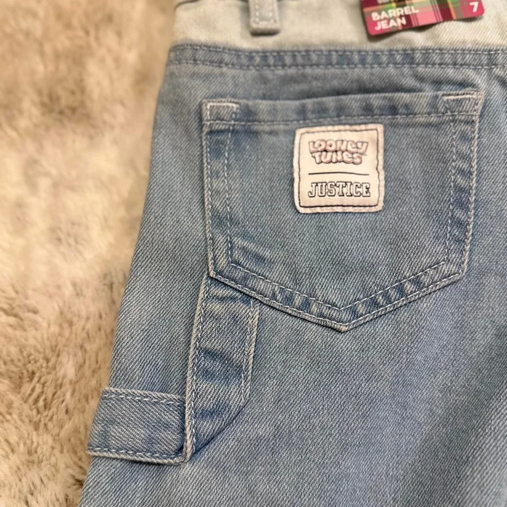 NWT Justice youth girls, Looney Tunes barrel jeans, size 7